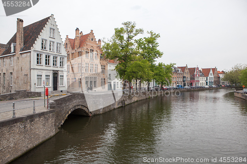 Image of Scenic cityscape with Green canal,