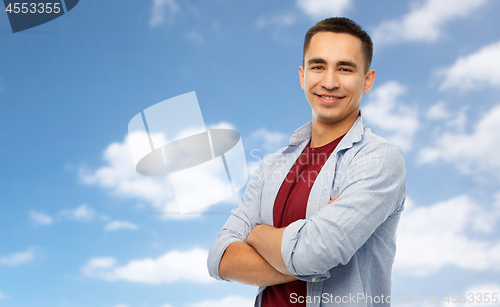 Image of smiling young man over white background