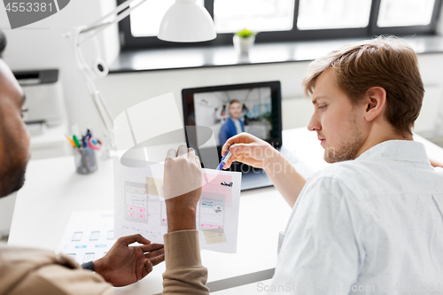 Image of creative team having video conference at office