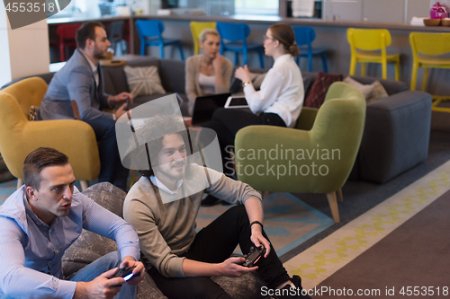 Image of startup Office Workers Playing computer games