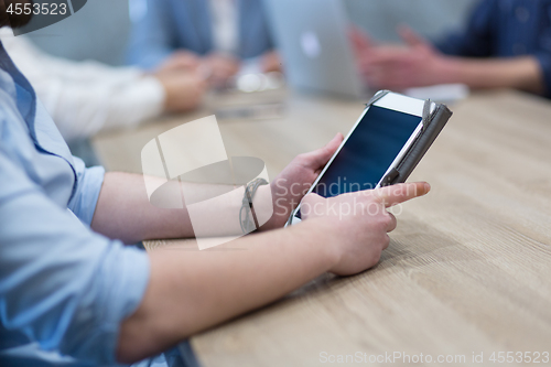 Image of businessman using tablet computer