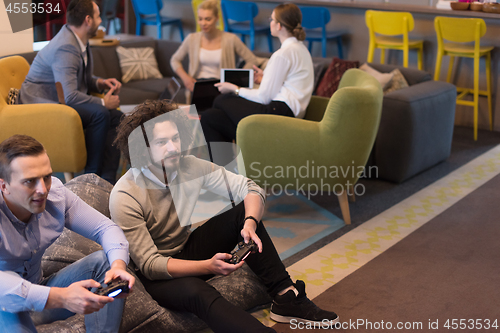 Image of startup Office Workers Playing computer games