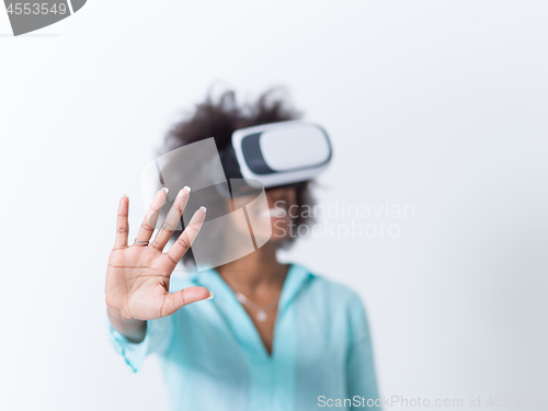 Image of black girl using VR headset glasses of virtual reality