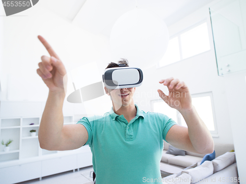 Image of man using VR-headset glasses of virtual reality