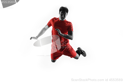 Image of Professional football soccer player isolated on white background