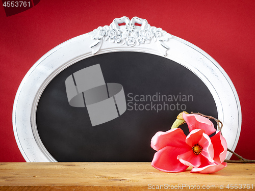 Image of Spring decoration magnolia flower and vintage frame