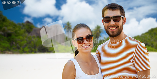 Image of happy couple in sunglasses on seychelles island