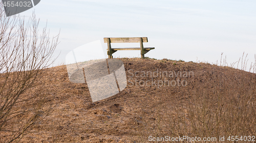 Image of Wooden bench in a public park