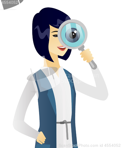 Image of Young asian business woman with magnifying glass.