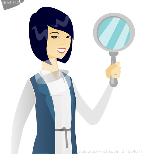 Image of Young asian business woman with magnifier.