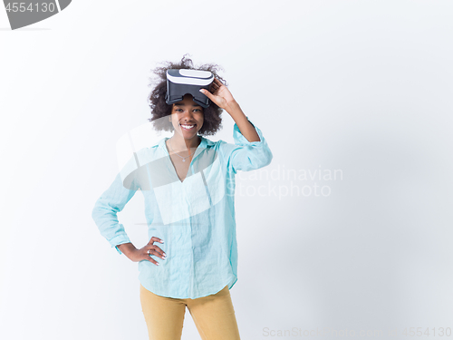 Image of black girl using VR headset glasses of virtual reality