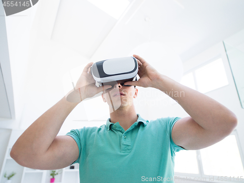 Image of man using VR-headset glasses of virtual reality