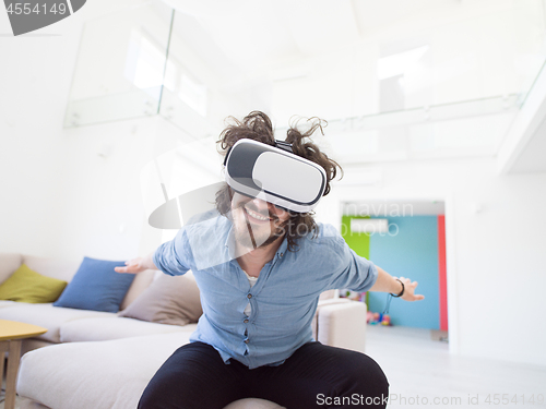 Image of man using VR-headset glasses of virtual reality