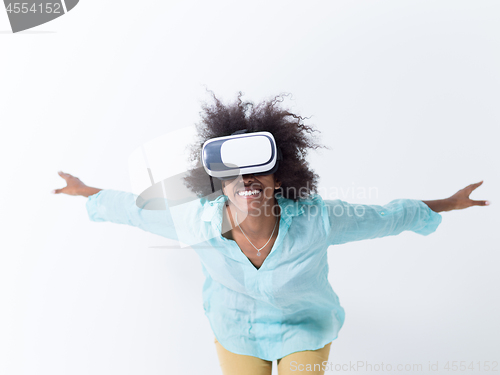 Image of black girl using VR headset glasses of virtual reality