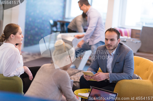 Image of Startup Business Team At A Meeting at modern office building