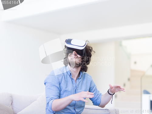 Image of man using VR-headset glasses of virtual reality