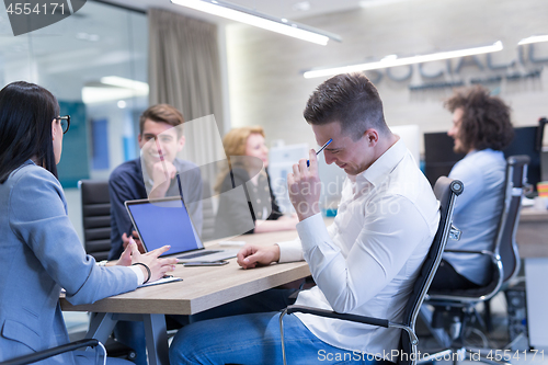 Image of Startup Business Team At A Meeting at modern office building