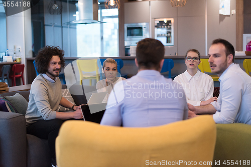 Image of Startup Business Team At A Meeting at modern office building