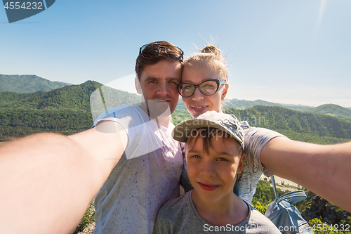 Image of Selfie of family in mountain