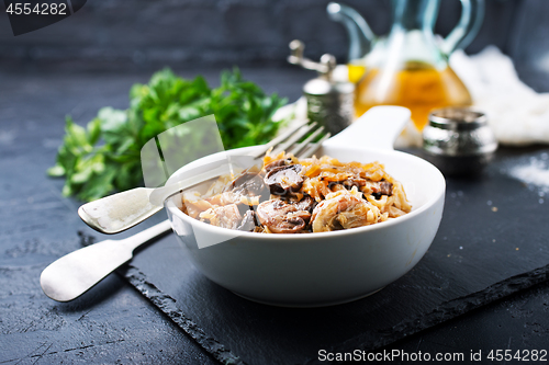 Image of fried cabbage with mushrooms