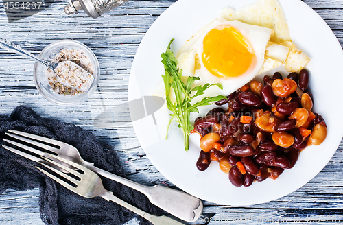 Image of fried bean with fried eggs