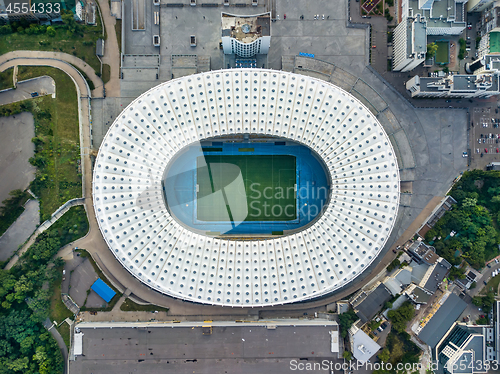 Image of KYIV, UKRAINE - July 19, 2018. Aerial viev from drone to the stadium -National Sports Complex NSC Olimpiysky with the area around the stadium.