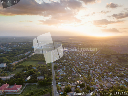 Image of Aerial panoramic view from the drone to the national dendrological park Sofiyivka and the city of Uman, Ukraine in the summer at sunset