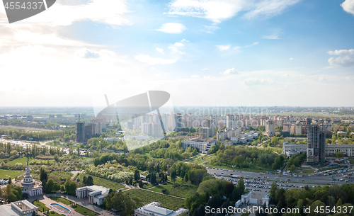 Image of The panoramic bird\'s eye view shooting from drone to modern city district with urban infrastructure and residential buildings of Kiev, Ukraine at summer sunset.