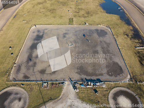 Image of Kiev, Ukraine.- February 02,2018: Aerial view on a hippodrome with a horse, people and shadows