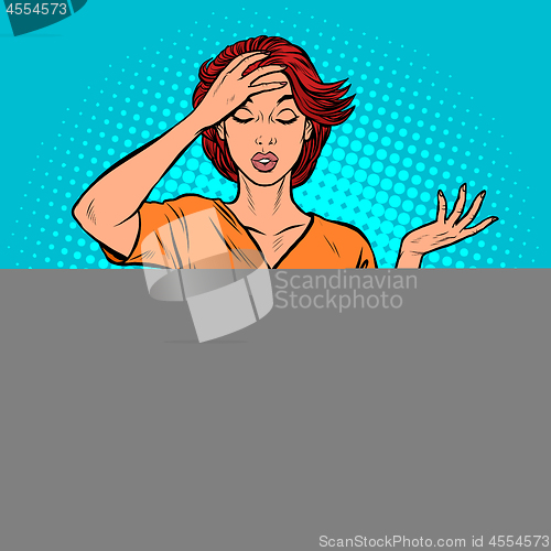 Image of A young woman holds his hand to his head. Headache