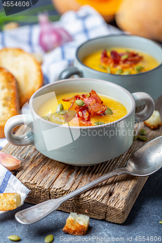 Image of Delicious pumpkin soup with bacon.