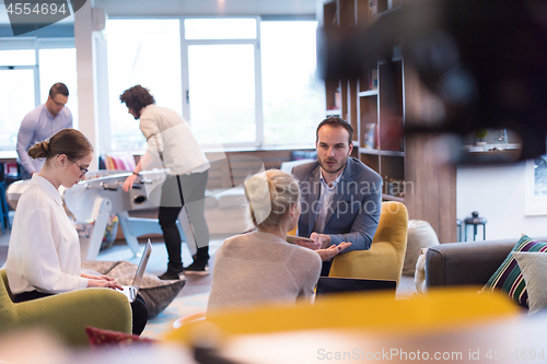 Image of Startup Business Team At A Meeting at modern office building