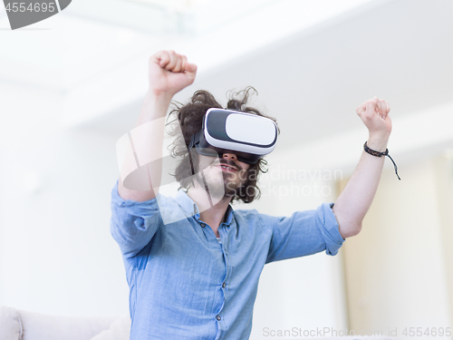 Image of man using VR-headset glasses of virtual reality