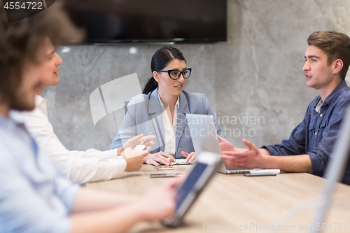 Image of Startup Business Team At A Meeting at modern office building