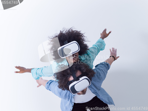 Image of multiethnic couple getting experience using VR headset glasses