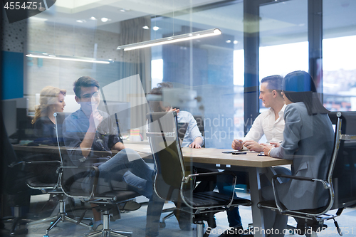 Image of Startup Business Team At A Meeting at modern office building