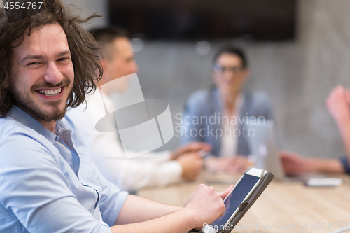 Image of Startup Business Team At A Meeting at modern office building