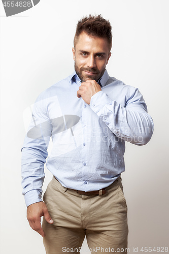 Image of bearded man open shirt