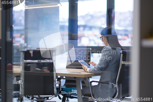 Image of Businesswoman using tablet