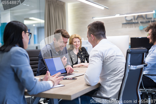 Image of Startup Business Team At A Meeting at modern office building