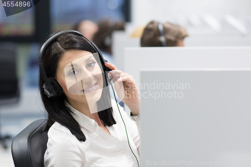 Image of female call centre operator doing her job