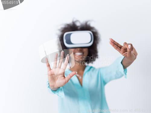 Image of black girl using VR headset glasses of virtual reality