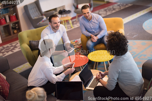 Image of Startup Business Team At A Meeting at modern office building