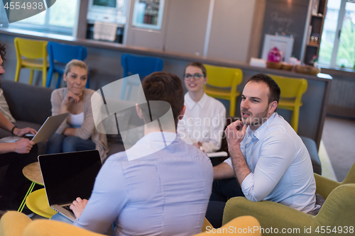 Image of Startup Business Team At A Meeting at modern office building