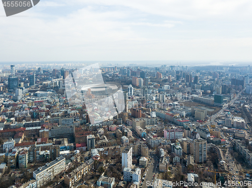 Image of The city of Kiev, modern houses and roads with lots of cars. The area of Kiev with the Olympic Sports Complex