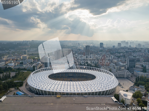 Image of KYIV, UKRAINE - July 19, 2018. National Sports Complex Olympic, stadium NSC Olimpiysky. Panoramic viev from drone of cityscape and the stadium.