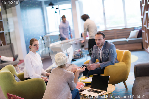 Image of Startup Business Team At A Meeting at modern office building