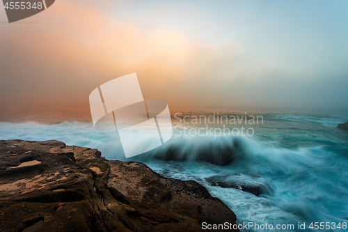 Image of Foggy sunrise Sydney coast seascape