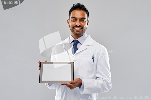 Image of male doctor or scientist with tablet computer