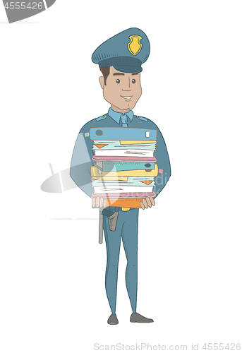 Image of Young hispanic policeman holding pile of folders.